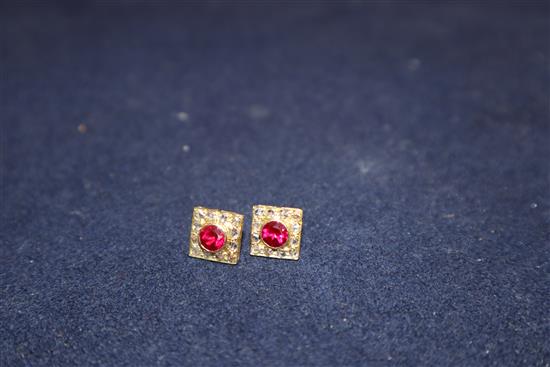 A pair of yellow metal, red stone and rose cut diamond set tablet ear studs.